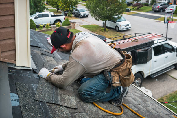 Professional Gutter Installation technician working in Louisville, CO